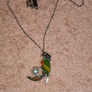 Parrots stained glass like pearl necklace